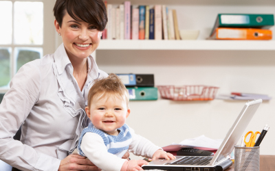 Mother and child working at computer
