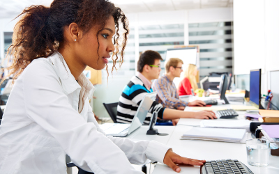  Young woman working at desk