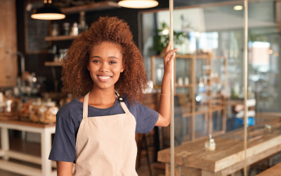 a barista smiling