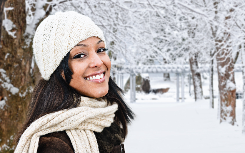smiling woman outside in winter